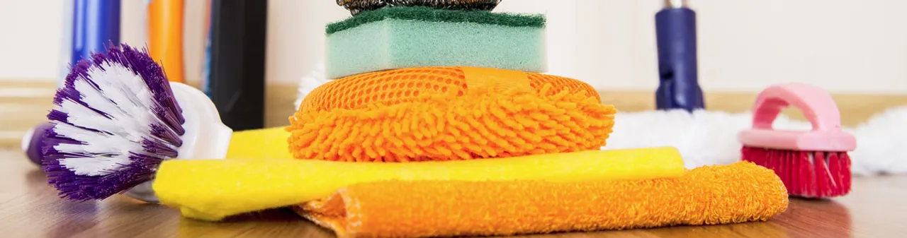 Cleaning brushes and clothes on the floor